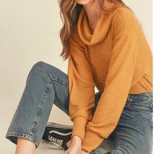 Free People Juicy Long Sleeve split back top in canyon moon
